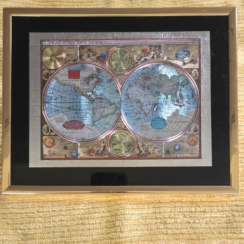 Vintage World Map Art with Black and Gold Frame.